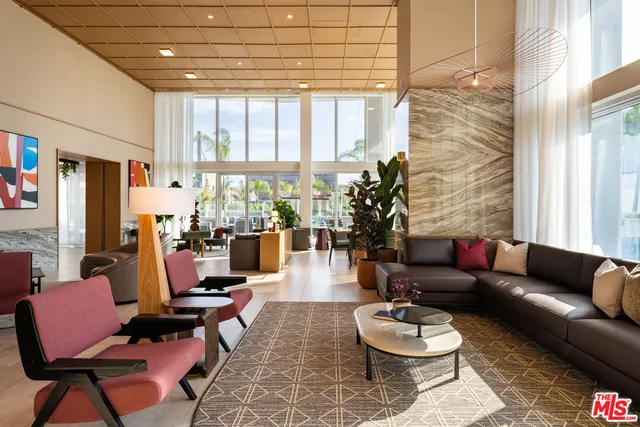 a view of a building with traffic signal lights