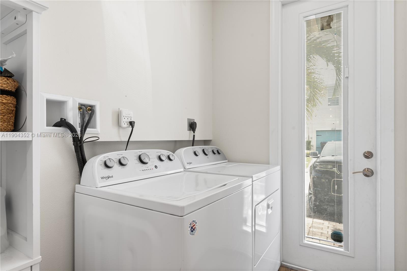 1030 Eucalyptus Drive, Unit 2 Hollywood, FL 33021 - Photo 21 of 22 a utility room with dryer and washer