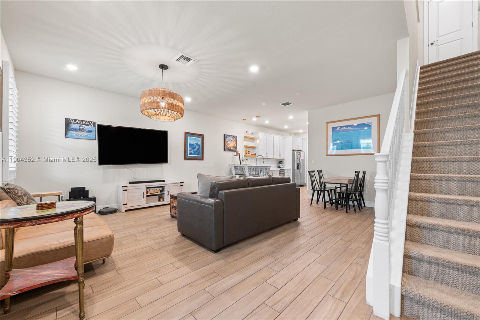 1030 Eucalyptus Drive, Unit 2 Hollywood, FL 33021 - Photo 7 of 22 a living room with furniture and a flat screen tv