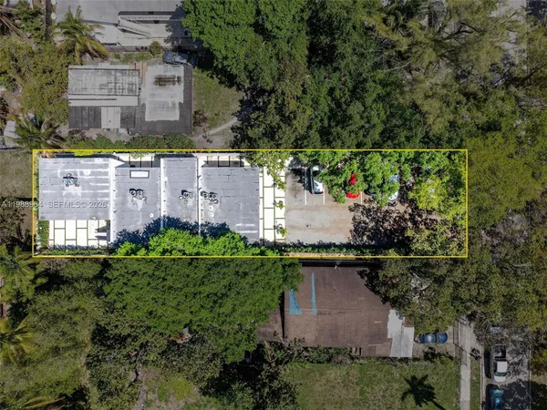 an aerial view of a house with a garden
