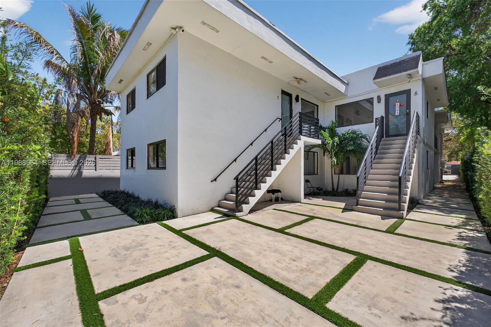 37 Northwest 59th Street, Unit 7 Miami, FL 33127 - Photo 7 of 19 a view of outdoor space yard deck and living room