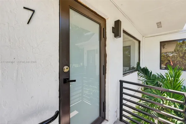 a view of front door and porch