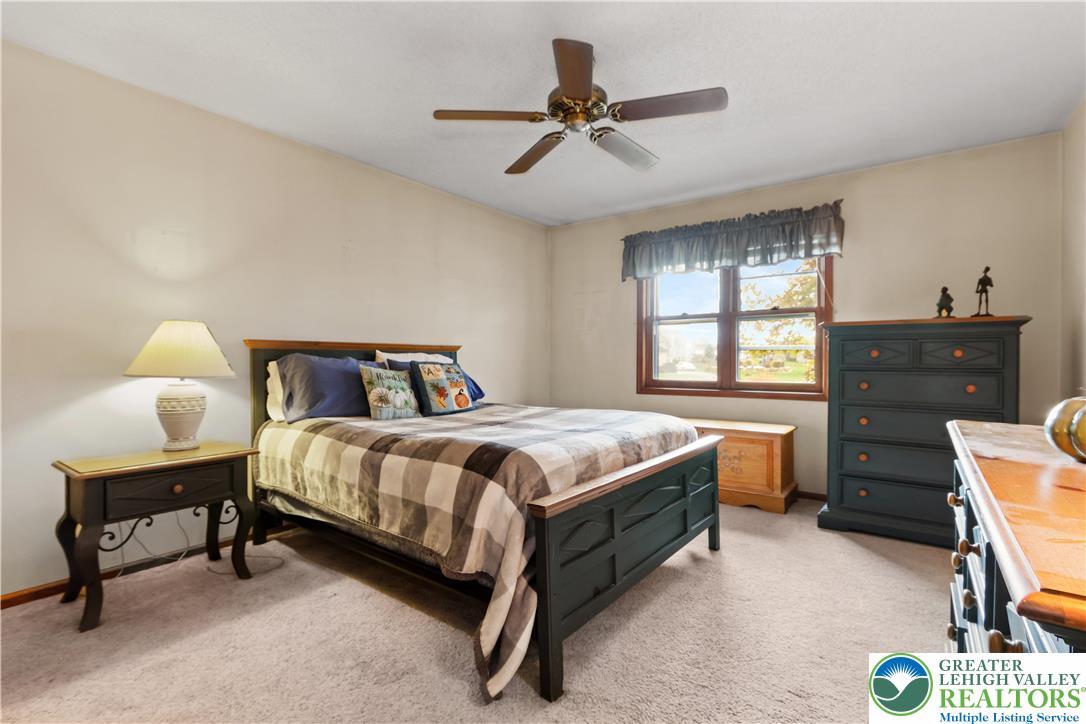 228 Cherry Hill Road Nazareth, PA 18064 - Photo 26 of 51 a bedroom with a bed and a window