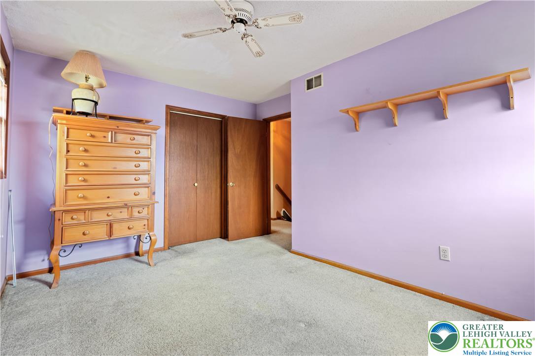 228 Cherry Hill Road Nazareth, PA 18064 - Photo 31 of 51 a view of an empty room with a ceiling fan
