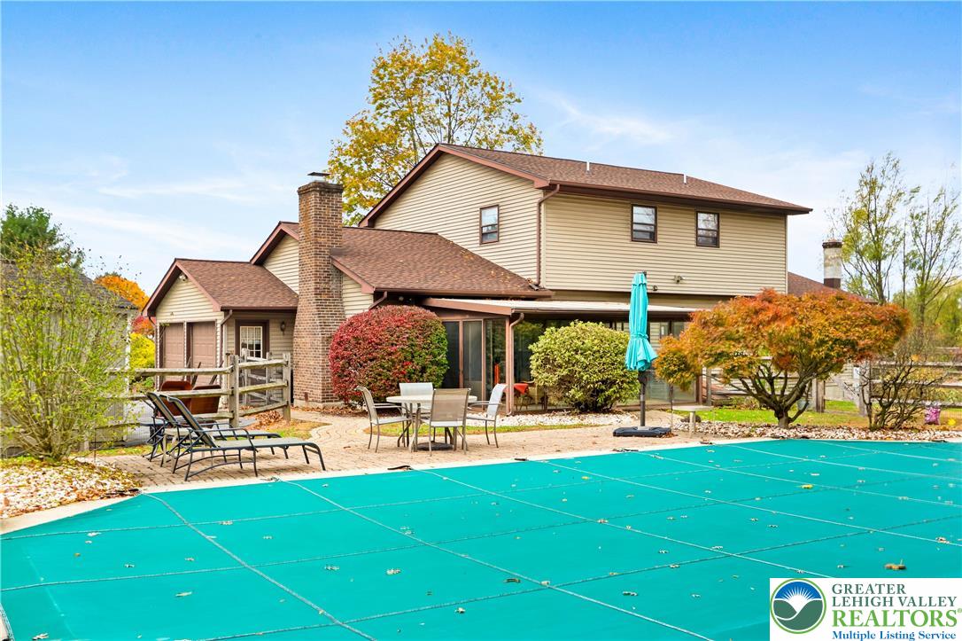 228 Cherry Hill Road Nazareth, PA 18064 - Photo 36 of 51 a view of a house with a yard porch and sitting area