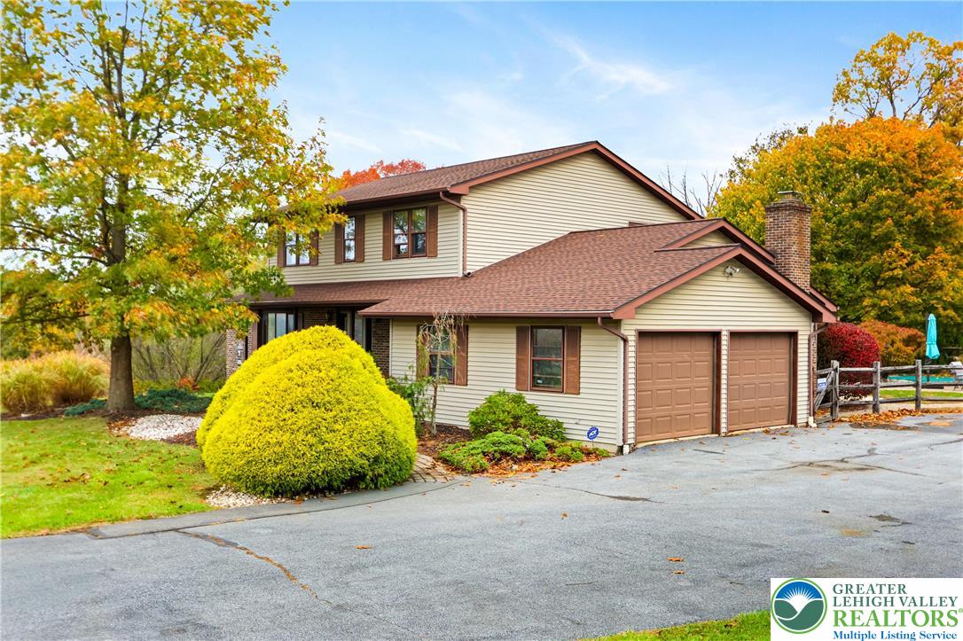 228 Cherry Hill Road Nazareth, PA 18064 - Photo 40 of 51 a view of a house with a patio and a yard