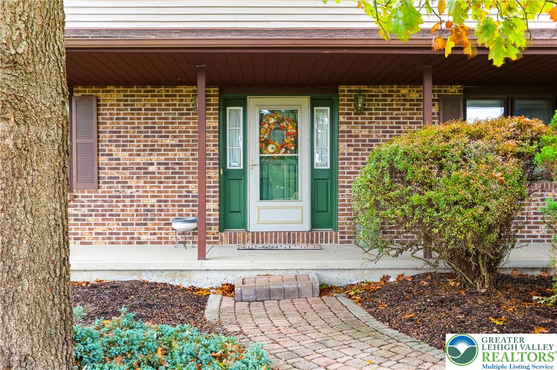 228 Cherry Hill Road Nazareth, PA 18064 - Photo 4 of 51 a view of entrance gate of the house and cars parked