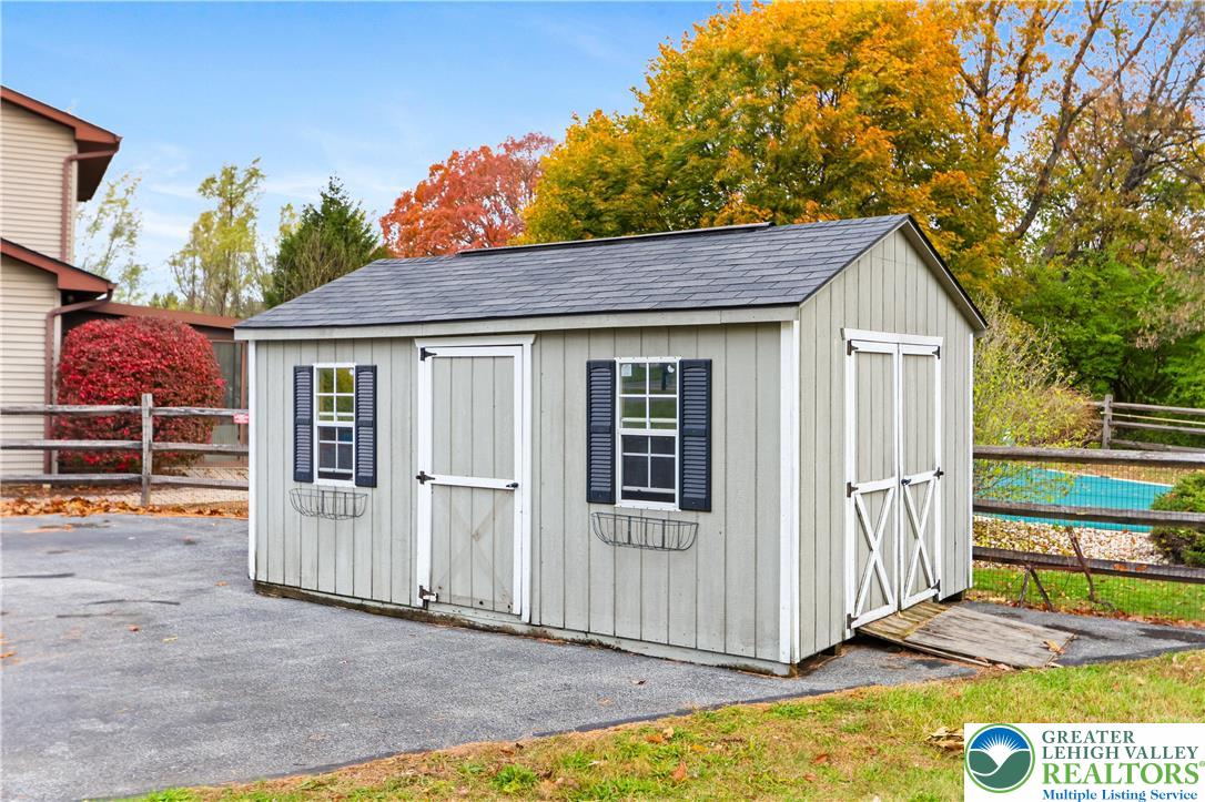 228 Cherry Hill Road Nazareth, PA 18064 - Photo 41 of 51 a view of a house with wooden fence