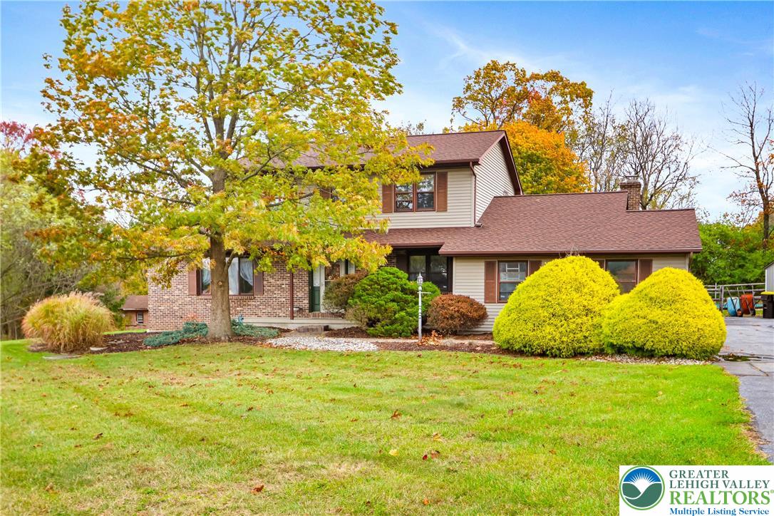 228 Cherry Hill Road Nazareth, PA 18064 - Photo 43 of 51 a view of a big house with a big yard and large tree