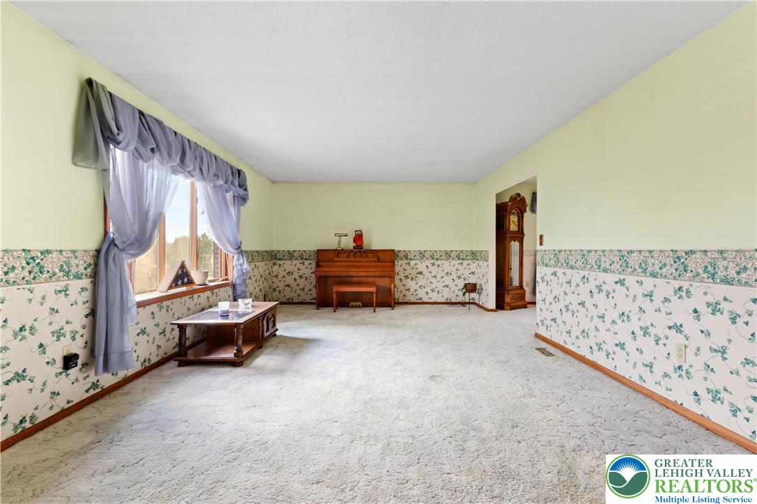 228 Cherry Hill Road Nazareth, PA 18064 - Photo 8 of 51 a bed room with a bed and a couch