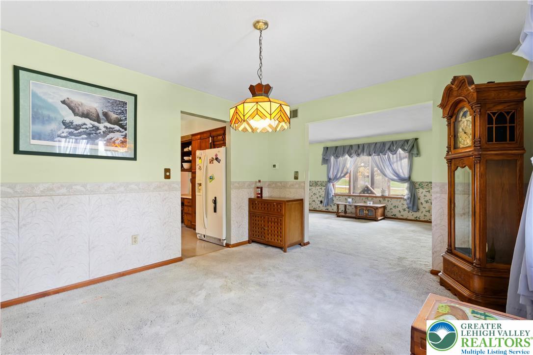 228 Cherry Hill Road Nazareth, PA 18064 - Photo 9 of 51 a room with furniture and a flat screen tv