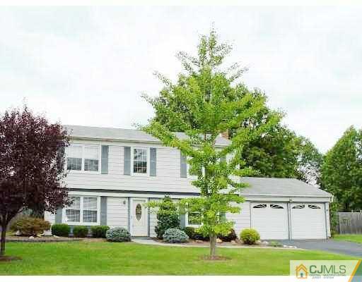 104 Hickory Road Somerset, NJ 08873 - Photo 1 of 10 a view of a house with a yard