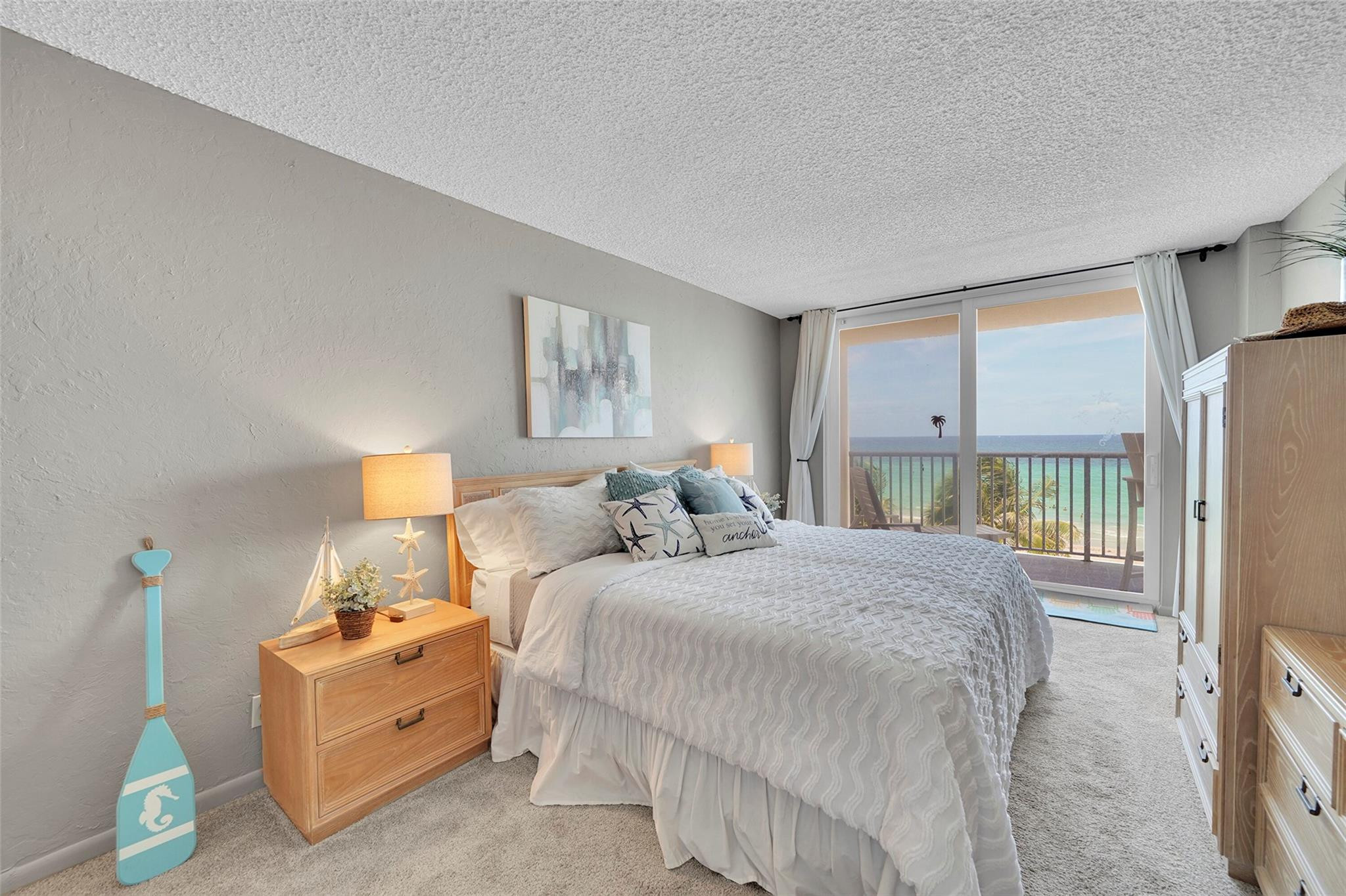 400 North Surf Road, Unit 503 Hollywood, FL 33019 - Photo 18 of 35 a bedroom with bed and a large window