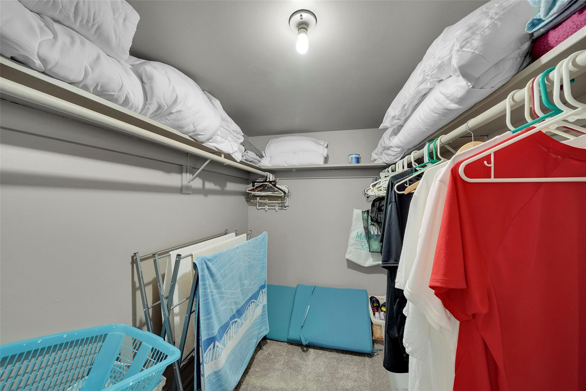 400 North Surf Road, Unit 503 Hollywood, FL 33019 - Photo 25 of 35 a view of walk in closet with clothes and shoes