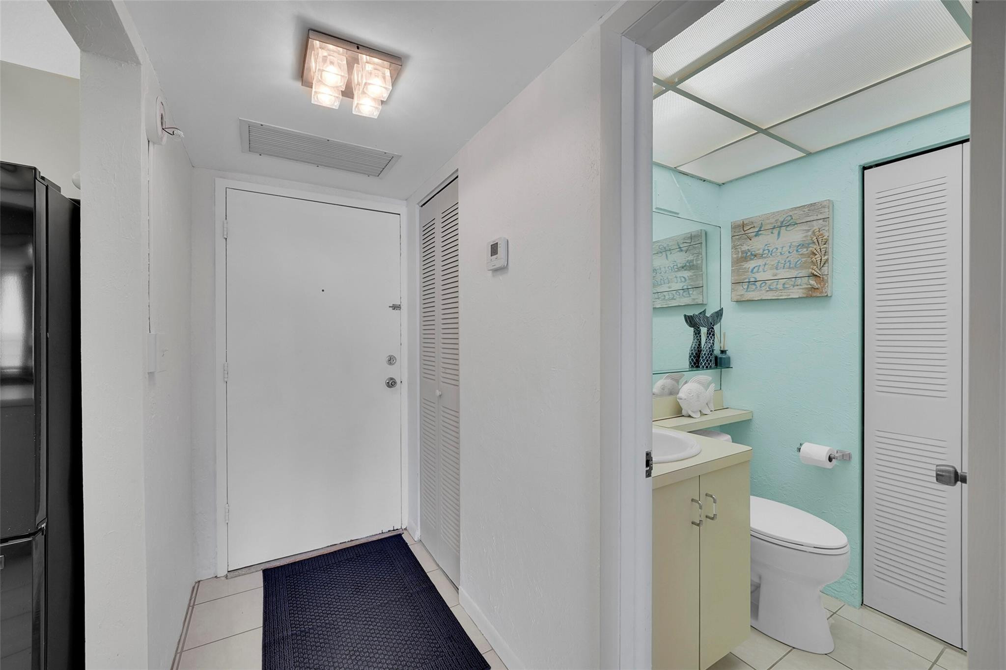 400 North Surf Road, Unit 503 Hollywood, FL 33019 - Photo 7 of 35 a bathroom with a toilet and a shower