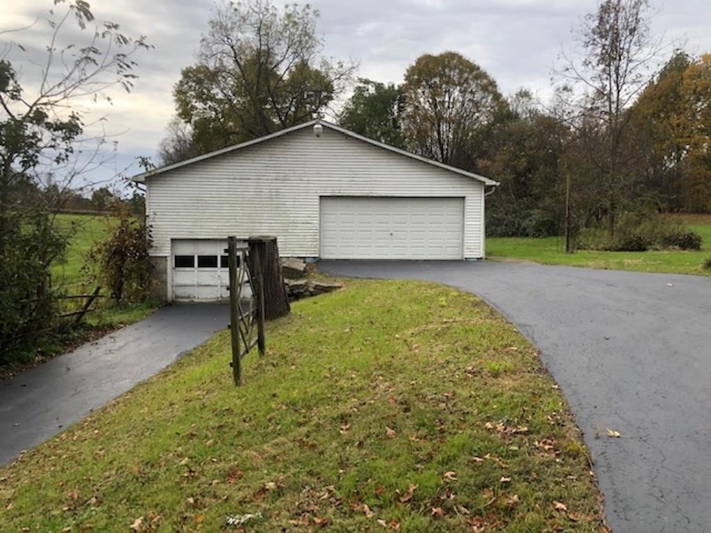 434 Old Sharon Road Mercer, PA 16137 - Photo 2 of 25 ENTER THE GARAGE FROM THIS SIDE FOR CARS OR FROM SIDE WITH FARM EQUIP THOUGH 12 FOOT DOORS. 2 LARGE OFFICES ARE ALSO IN THIS GARAGE BUILDING.