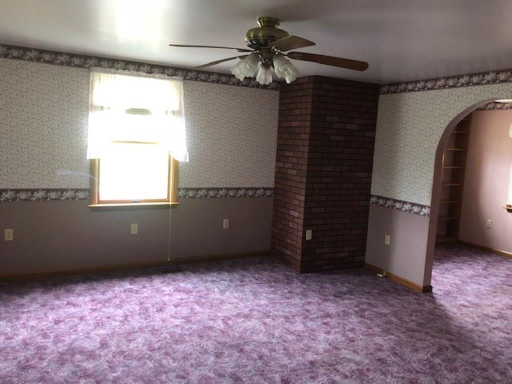 434 Old Sharon Road Mercer, PA 16137 - Photo 18 of 25 LIVING ROOM WITH PORTAL TO DEN/LIBRARY