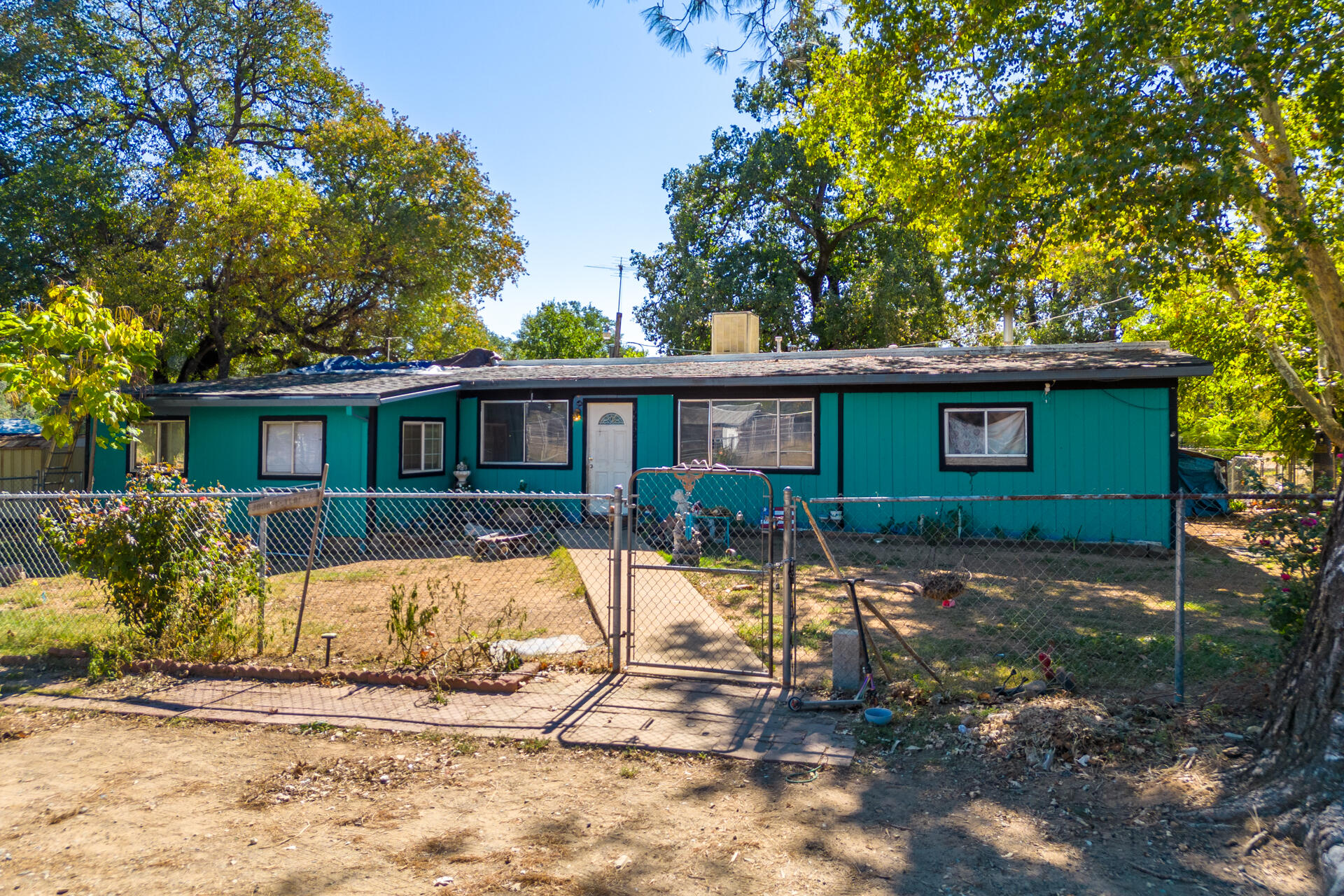 12125 Cinder Road Redding, CA 96003 - Photo 1 of 8 a view of a house with a yard
