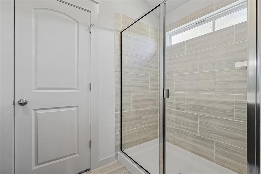 1714 Glacial Beech Place Forney, TX 75126 - Photo 16 of 25 Full bath featuring a shower stall
