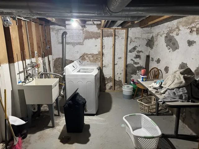 a view of a chairs and table in the room