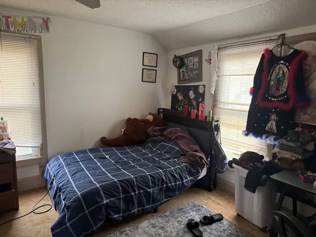 a view of a workspace with furniture