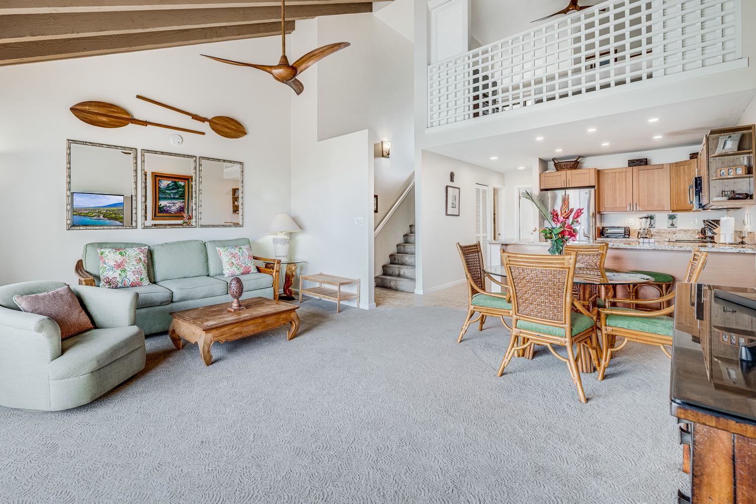 2777 South Kihei Road, Unit J214 Kihei, HI 96753 - Photo 4 of 46 a living room with furniture and a ceiling fan