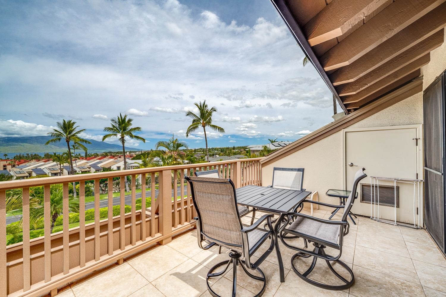 2777 South Kihei Road, Unit J214 Kihei, HI 96753 - Photo 10 of 46 a view of a chairs and table on the balcony