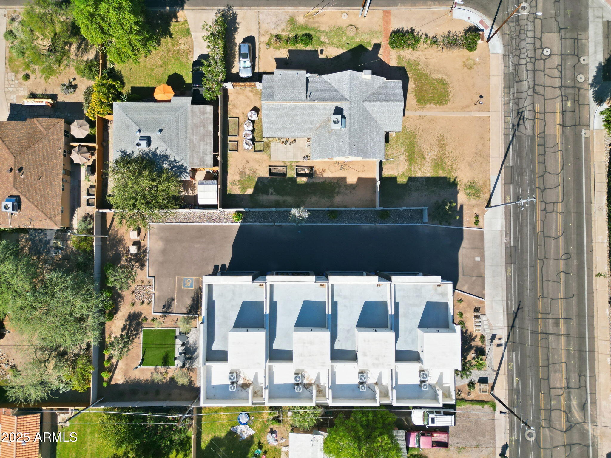3620 North 12th Street Phoenix, AZ 85014 - Photo 5 of 9 an aerial view of residential houses with outdoor space