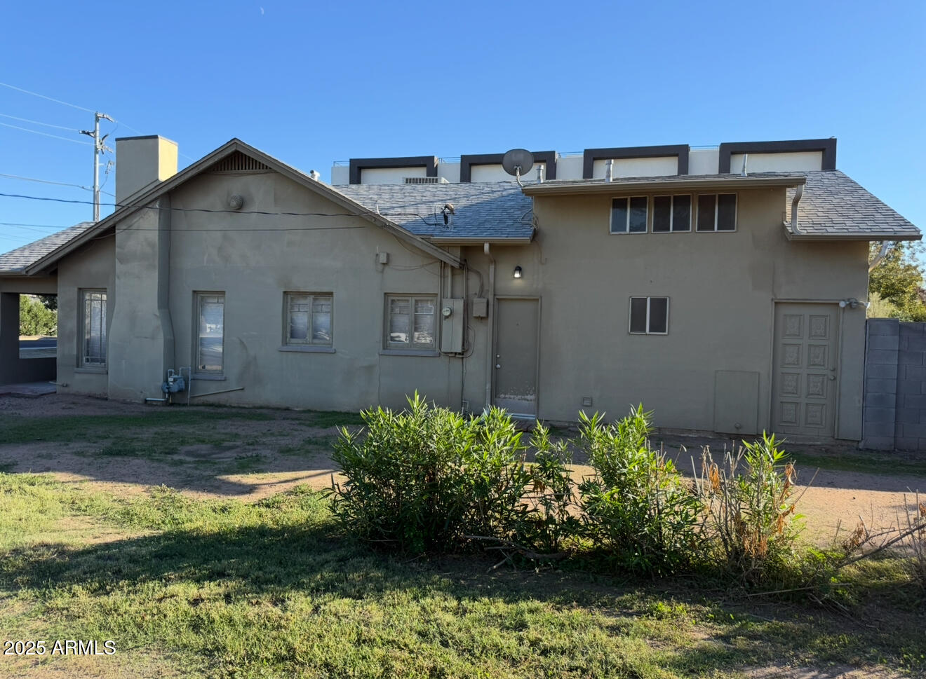 3620 North 12th Street Phoenix, AZ 85014 - Photo 9 of 9 a front view of a house with a yard