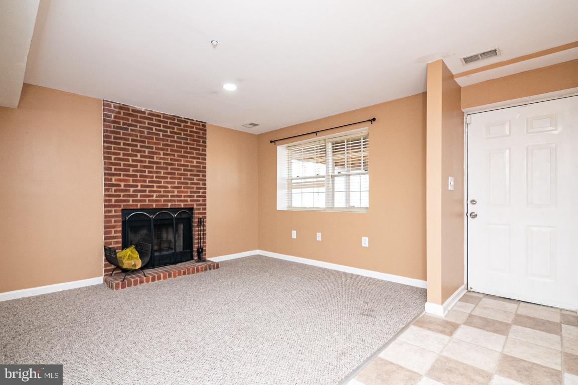 2017 Spring Grove Drive Accokeek, MD 20607 - Photo 27 of 35 BASEMENT FIREPLACE