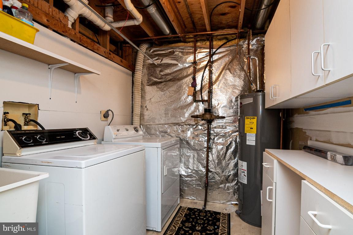 2017 Spring Grove Drive Accokeek, MD 20607 - Photo 29 of 35 BASEMENT LAUNDRY RM WITH CUPBOARDS