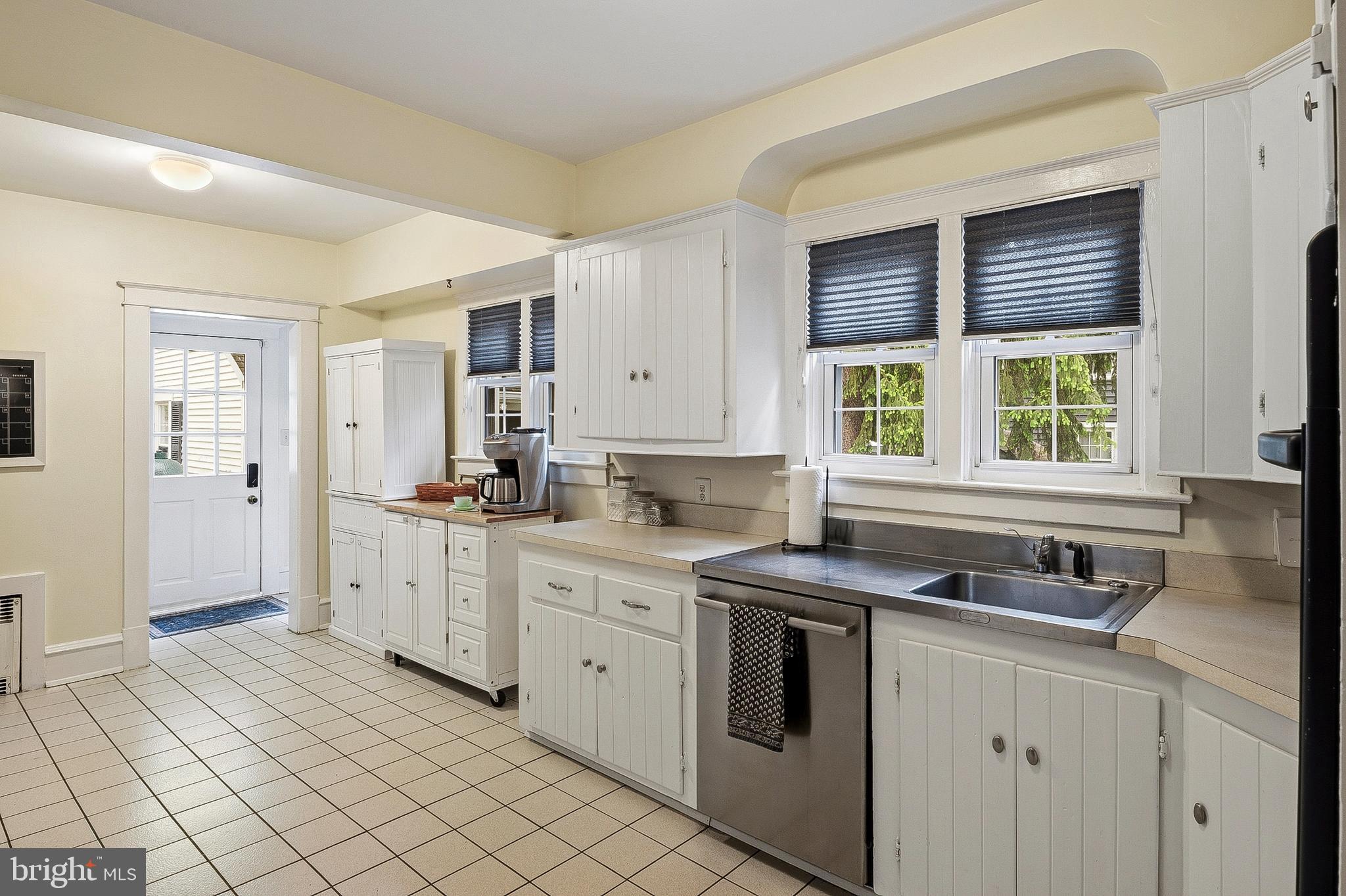 5952 Old Washington Road Elkridge, MD 21075 - Photo 11 of 43 a kitchen with a sink stove and cabinets