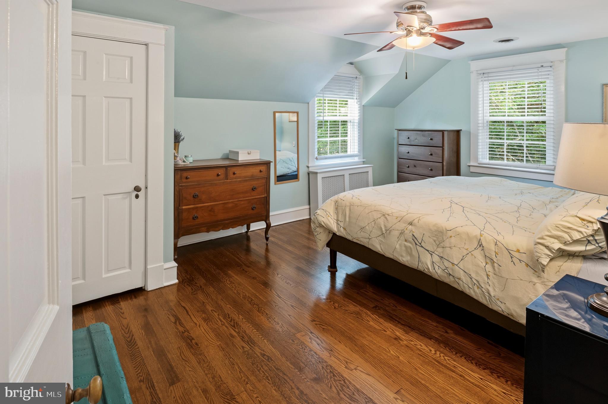 5952 Old Washington Road Elkridge, MD 21075 - Photo 21 of 43 a bedroom with a bed and wooden floor