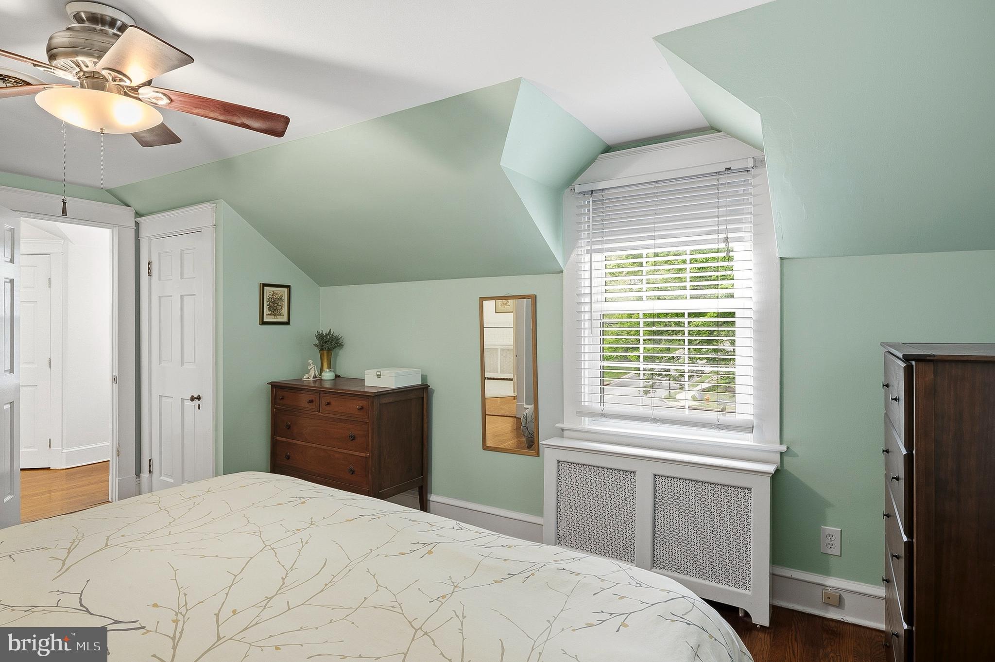 5952 Old Washington Road Elkridge, MD 21075 - Photo 22 of 43 a bedroom with a bed and a chandelier