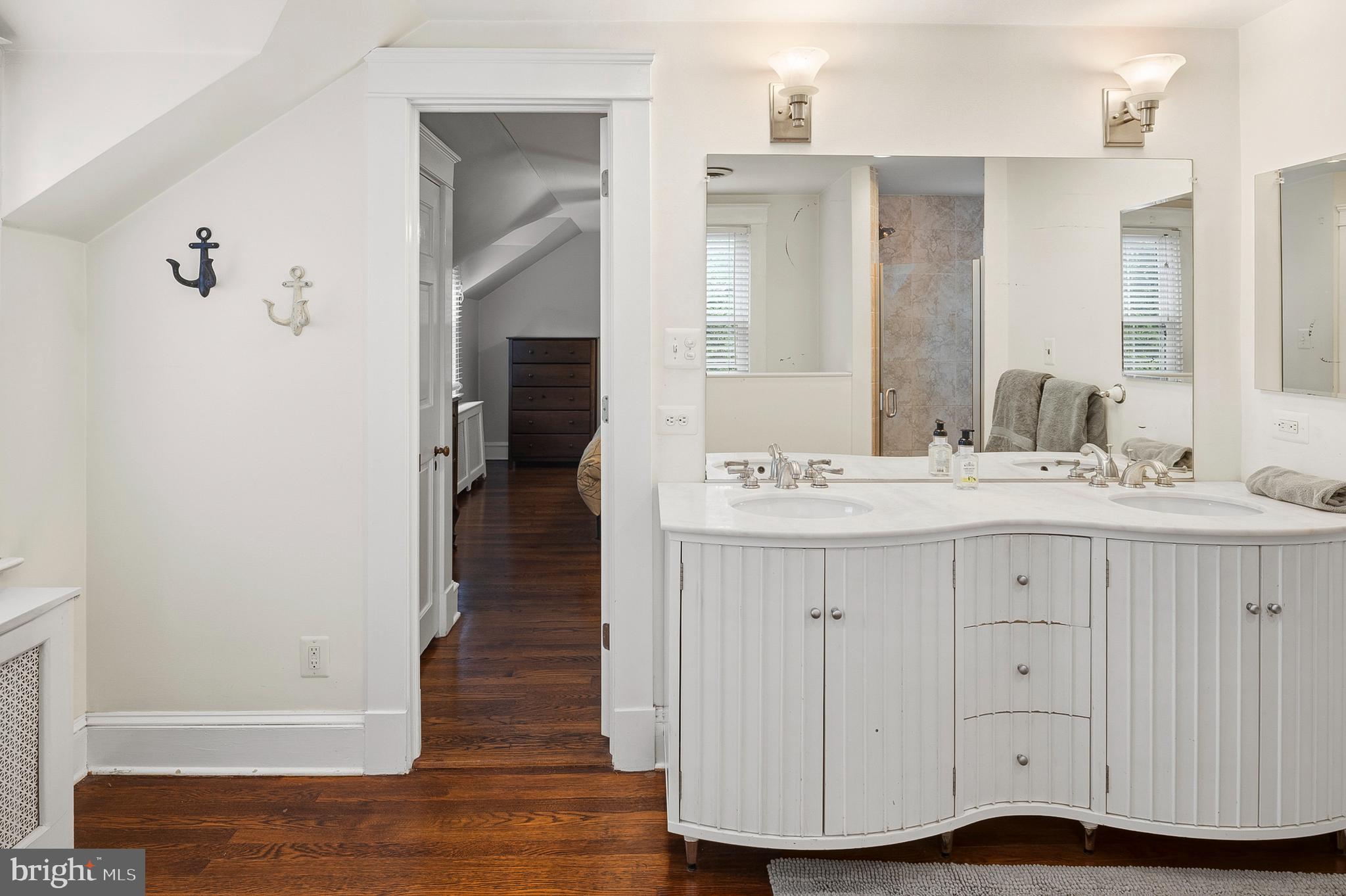 5952 Old Washington Road Elkridge, MD 21075 - Photo 23 of 43 a bathroom with a sink and a mirror