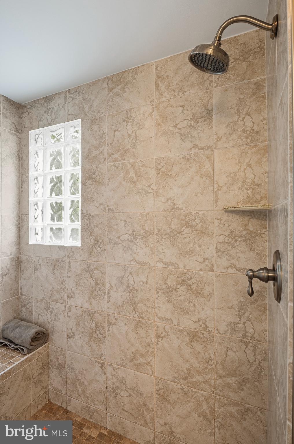 5952 Old Washington Road Elkridge, MD 21075 - Photo 25 of 43 a bathroom with a shower