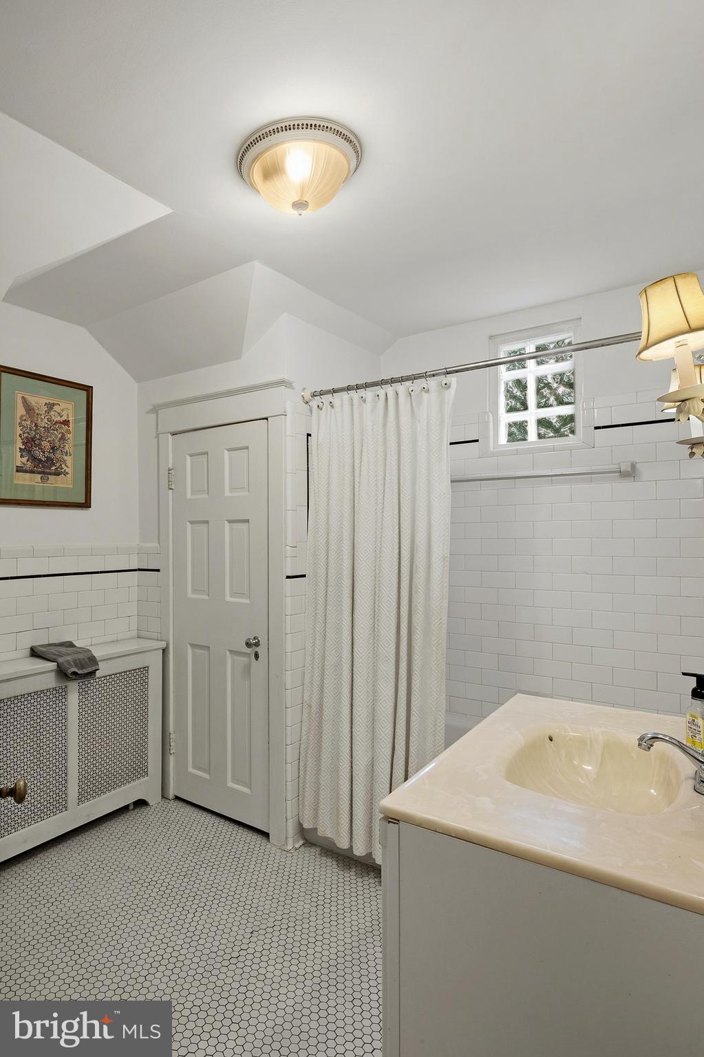 5952 Old Washington Road Elkridge, MD 21075 - Photo 31 of 43 a view of a bathroom with tub