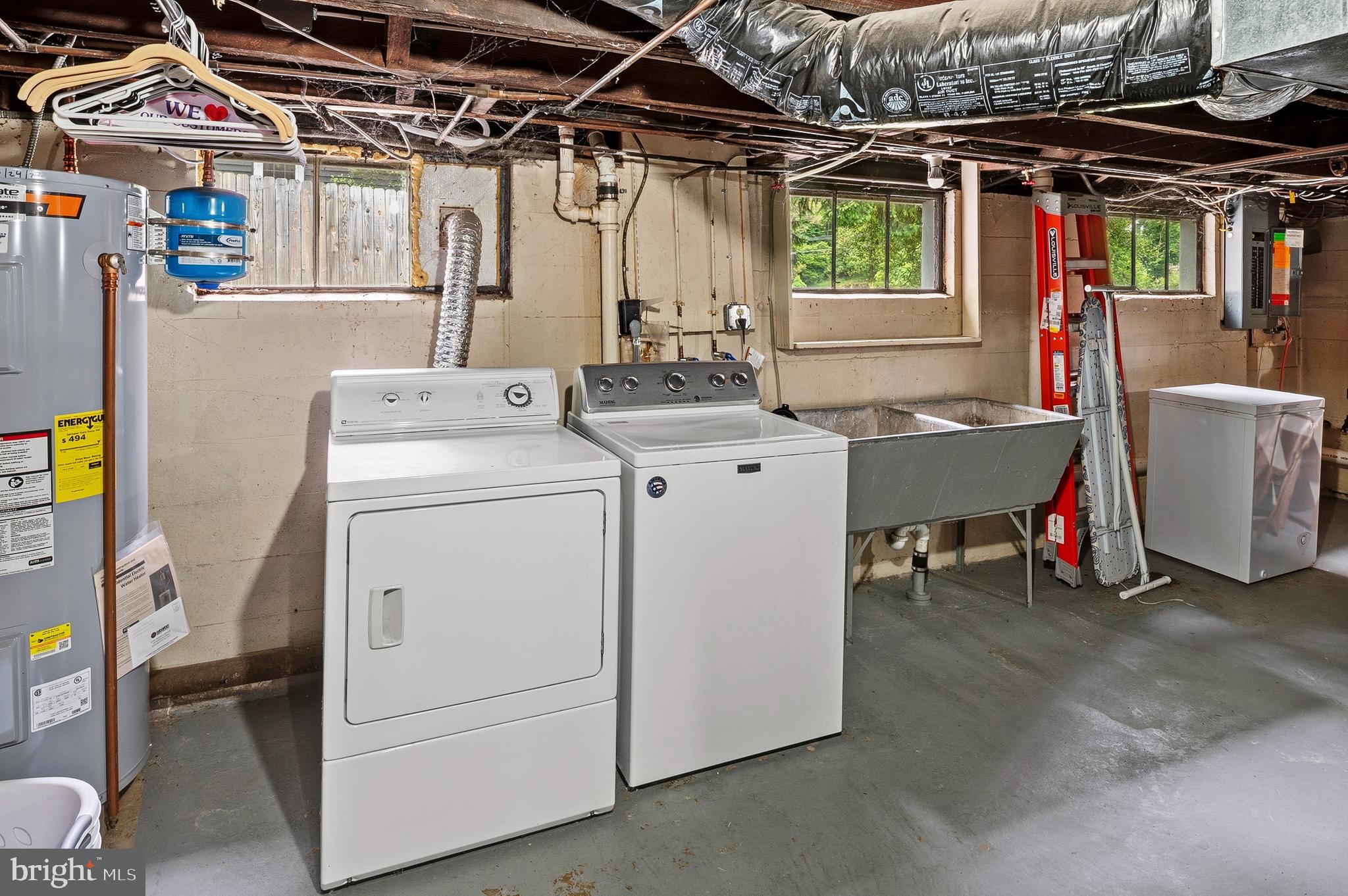 5952 Old Washington Road Elkridge, MD 21075 - Photo 36 of 43 a utility room with dryer and washer