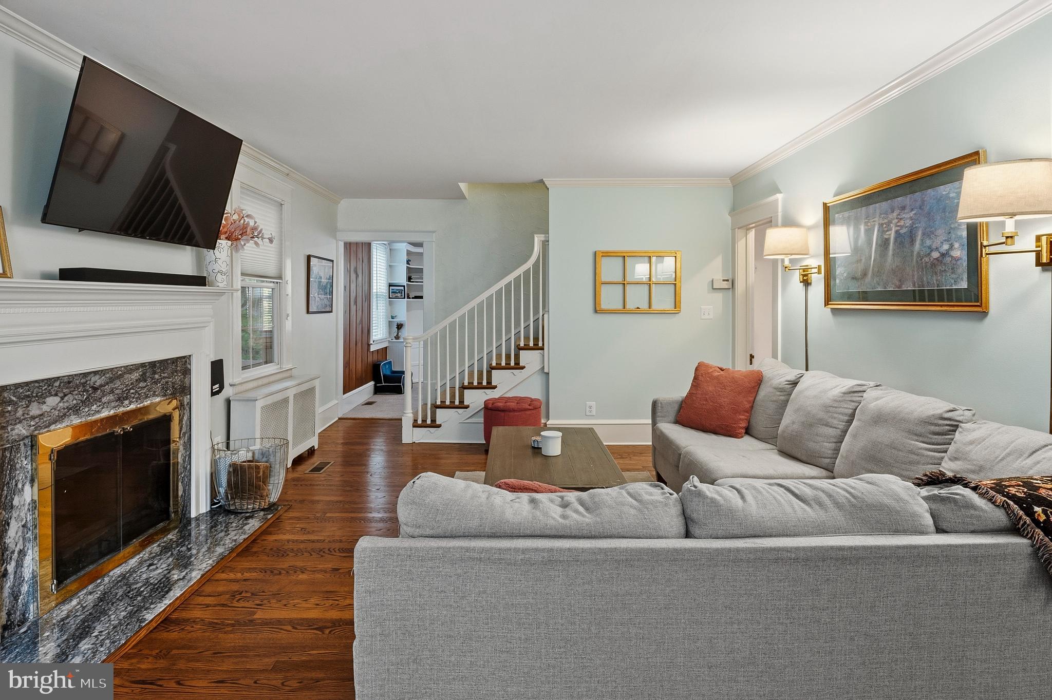 5952 Old Washington Road Elkridge, MD 21075 - Photo 6 of 43 a living room with furniture fireplace and flat screen tv
