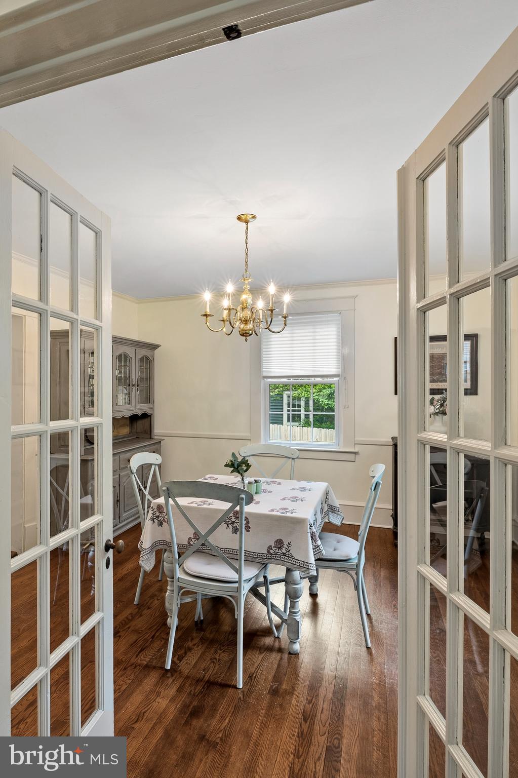 5952 Old Washington Road Elkridge, MD 21075 - Photo 7 of 43 a view of a dining room with furniture window and wooden floor