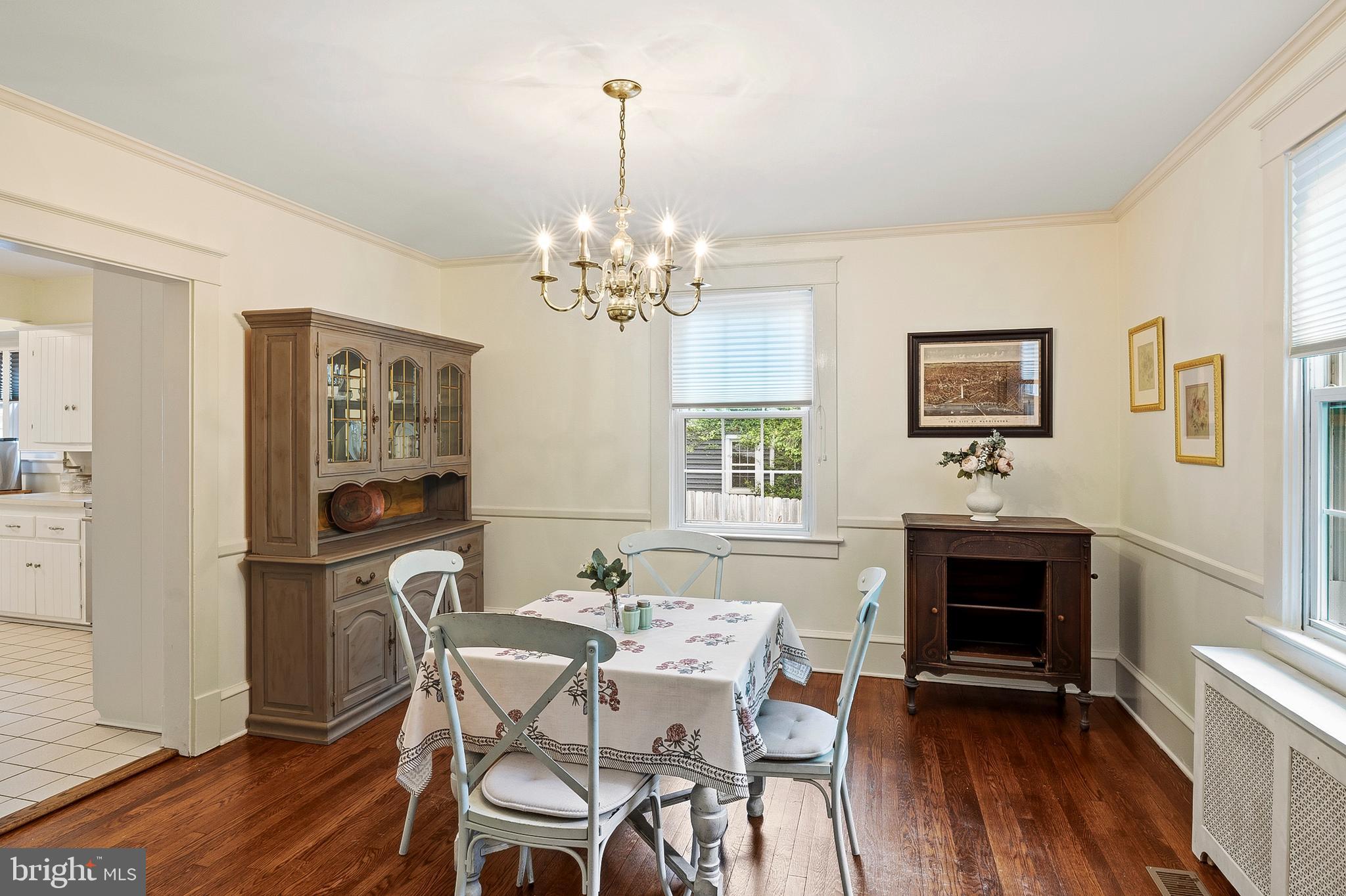 5952 Old Washington Road Elkridge, MD 21075 - Photo 8 of 43 a view of a dining room with furniture and wooden floor
