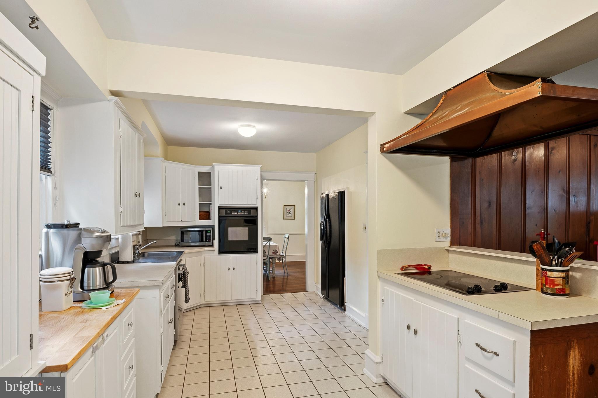 5952 Old Washington Road Elkridge, MD 21075 - Photo 10 of 43 a kitchen with a sink appliances and cabinets