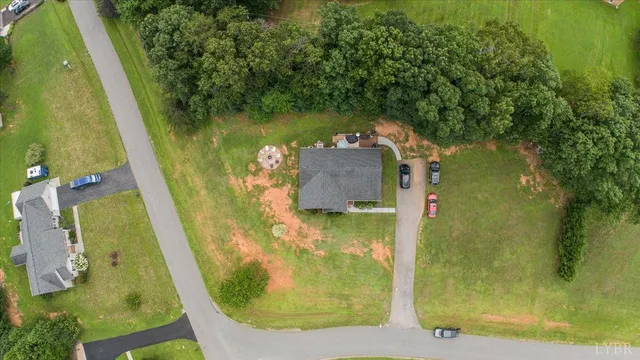a view of balcony with wooden floor and outdoor seating