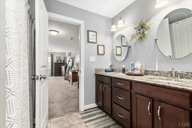 a small pool with a trees in the background