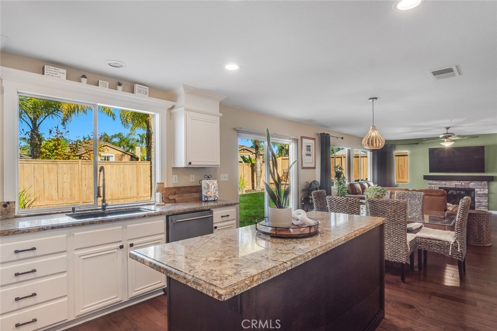 4330 Forest Ranch Way Oceanside, CA 92057 - Photo 14 of 51 A large window over the sink lets sunlight pour in, creating a bright and welcoming kitchen.