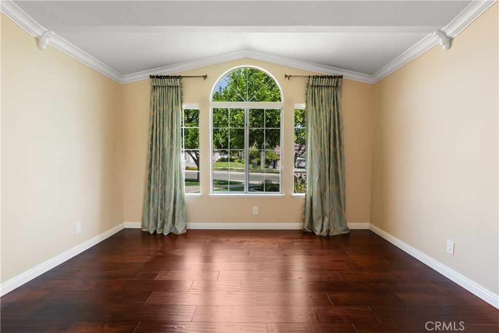 6717 Mission Grove Parkway North Riverside, CA 92506 - Photo 15 of 58 a view of room with window and wooden floor