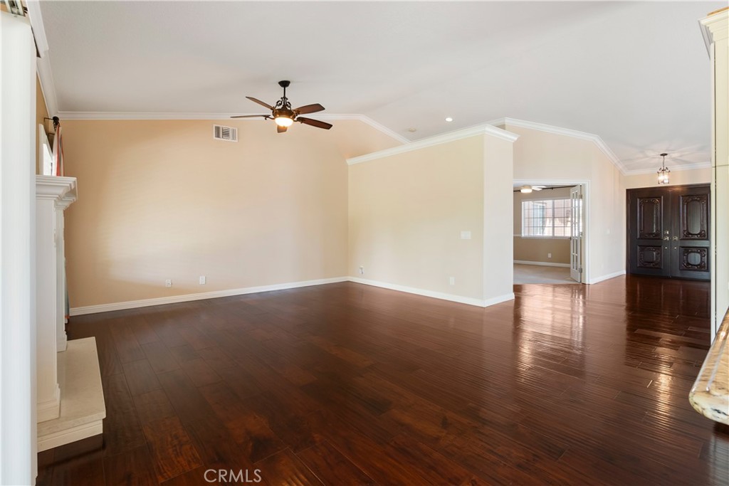 6717 Mission Grove Parkway North Riverside, CA 92506 - Photo 22 of 58 wooden floor in an empty room with a window
