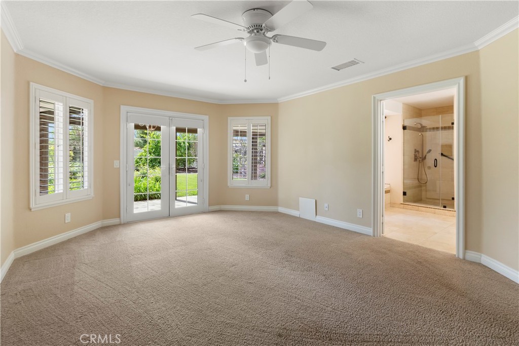 6717 Mission Grove Parkway North Riverside, CA 92506 - Photo 25 of 58 a view of a big room with windows and chandelier fan