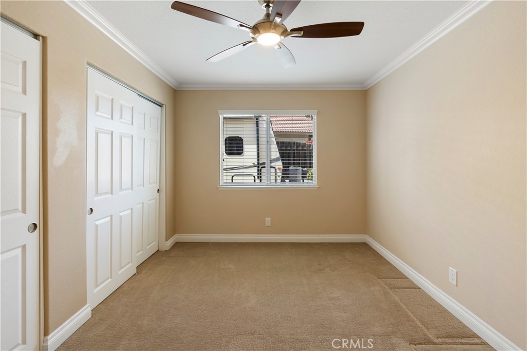 6717 Mission Grove Parkway North Riverside, CA 92506 - Photo 34 of 58 an empty room with windows and fan