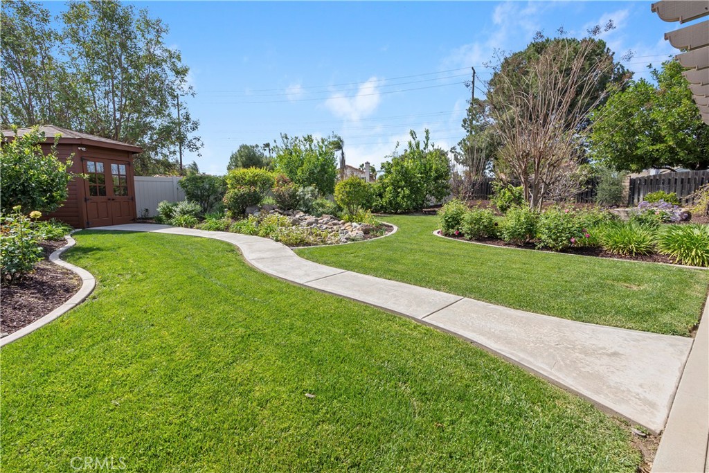 6717 Mission Grove Parkway North Riverside, CA 92506 - Photo 41 of 58 a view of a house with a yard